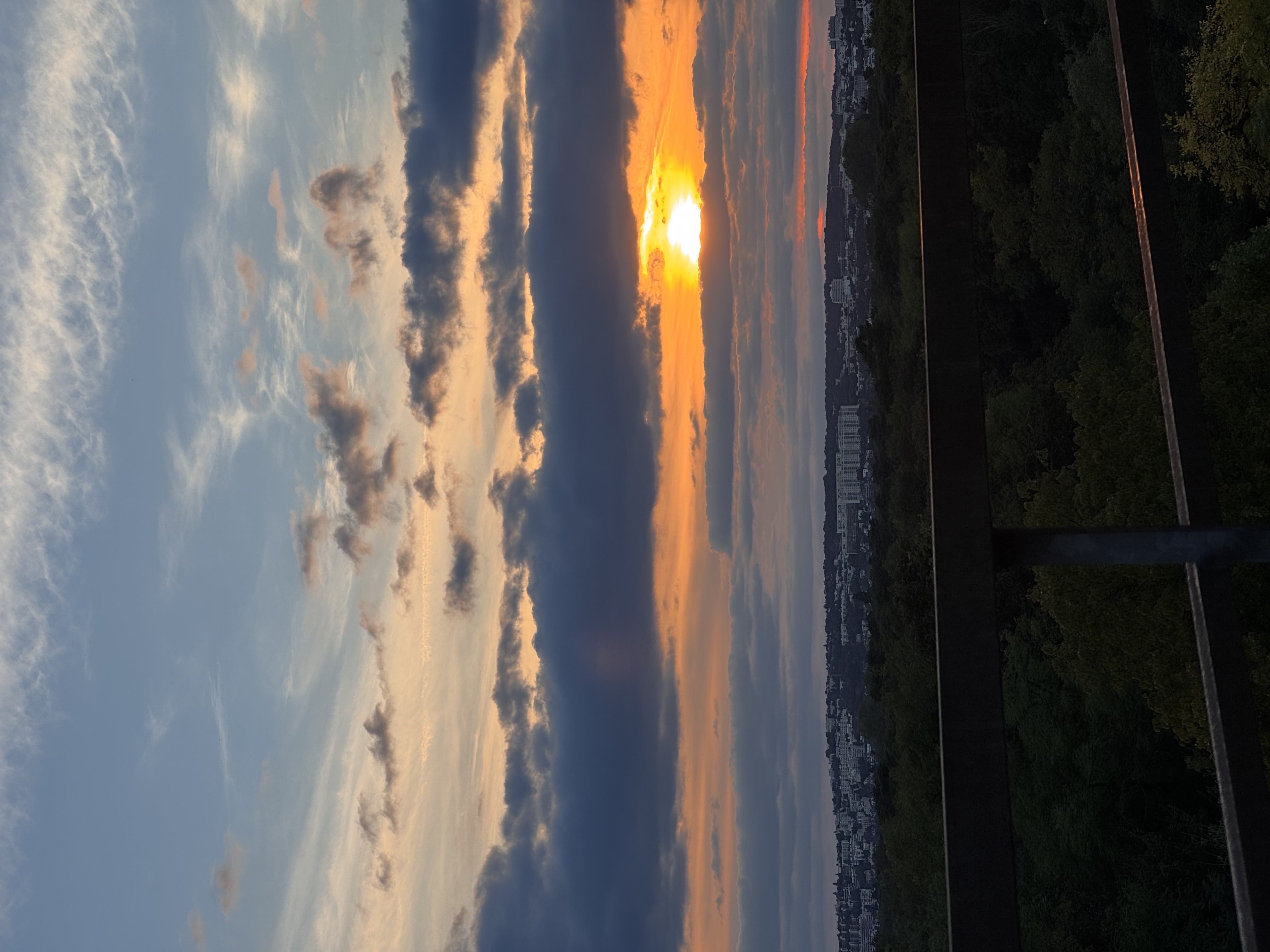 An urban sunset seen from an elevated viewpoint.